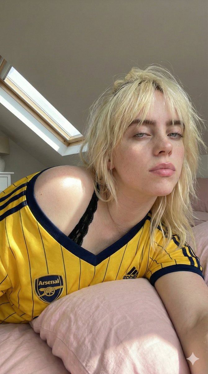 Candid Selfie in Soccer Jersey in an Attic Bedroom — example output